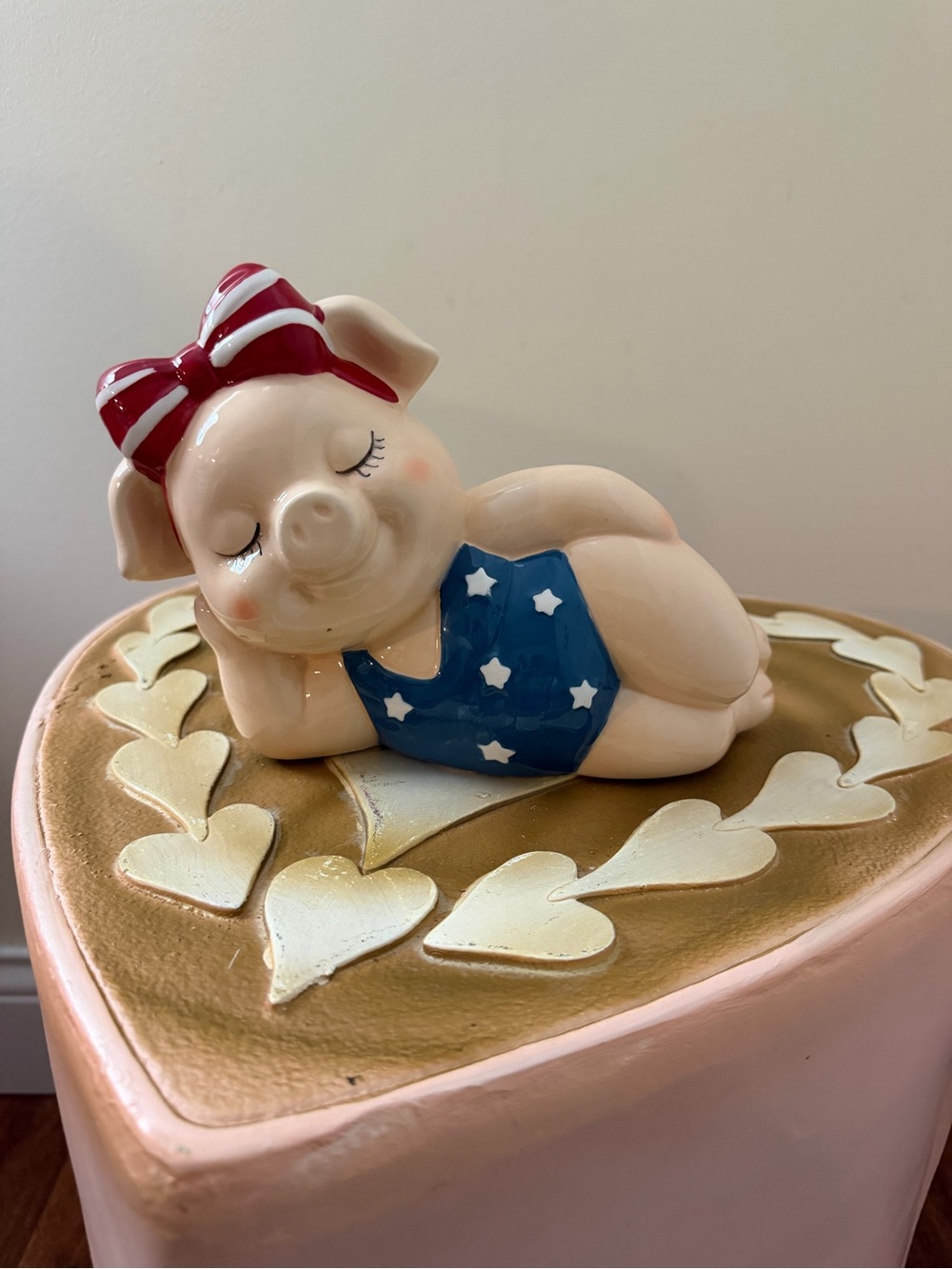 Ceramic 4th of July Pig Laying Down in Patriotic Bathing Suit & Bow